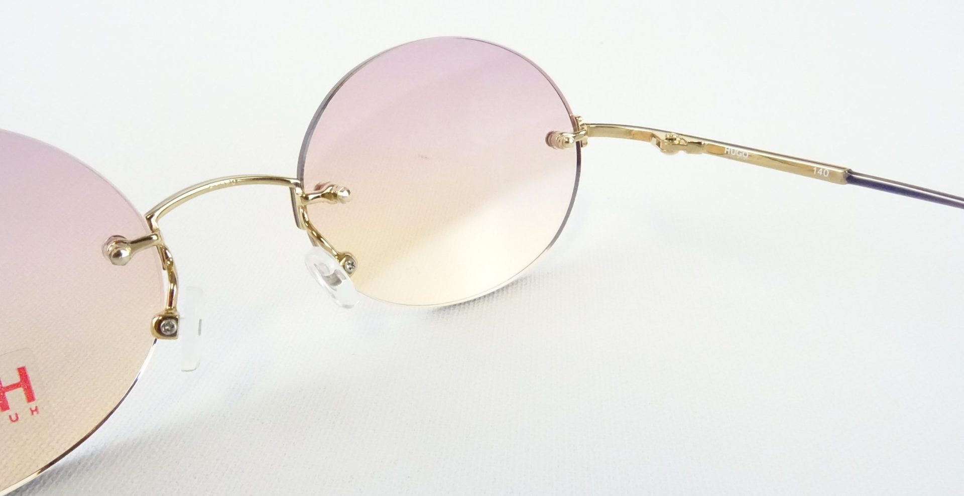 HUGO BOSS rahmenlose runde Damen Sonnenbrille mit Verlauftönung Gläser lila-orange Sonnenbrillen Designerfassung Gr. M – Bild 4