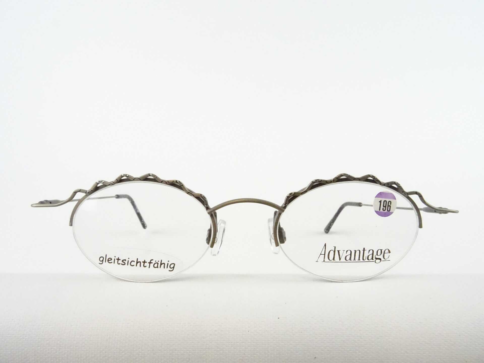 Brille Advantage Damenfassung Metallgestell silbergrau oval nur mit Oberrand ausgefallen verspielt Gr. M